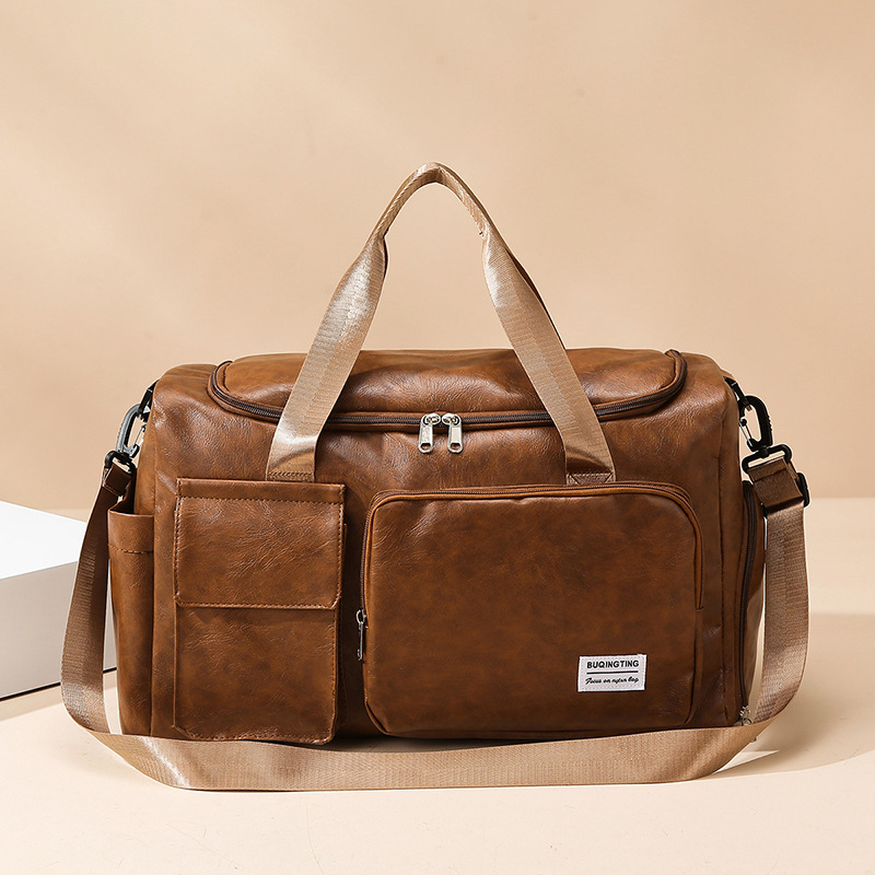 Nueva bolsa de viaje PU retro de gran capacidad portátil de viaje de hombres bolsa de ocio bolsa de gimnasio