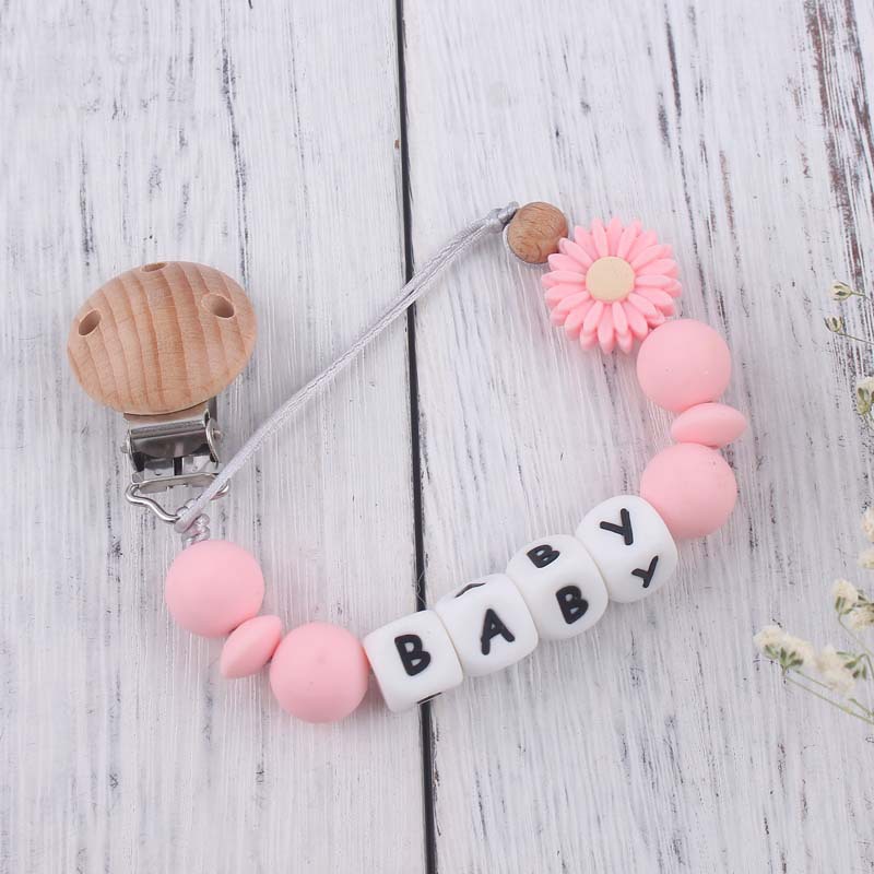 Nuevo bebé suministros de dibujos animados Margarita silicona mordedor creativo DIY nombre mordedura pegamento molar pezón cadena