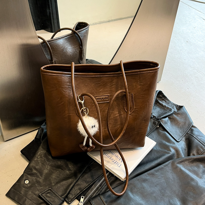 Transfronterizos más vendidos ocio simple bolso de gran capacidad 2025 nuevo producto explosivo bolso de hombro retro bolso de brazo de viaje