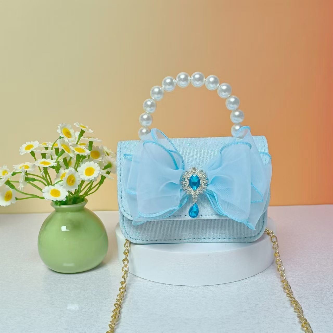 Nuevo tipo de bolsos para niños, bolsos de moda, bolsos de princesa de viento, bolsos portátiles lindos para chicas, bolsos de red para bebés.