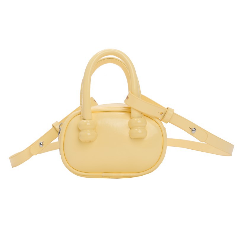 Moda coreana popular bolso de hombro para niñas simple bolso de bebé de color sólido bolso de bolso mini para niños