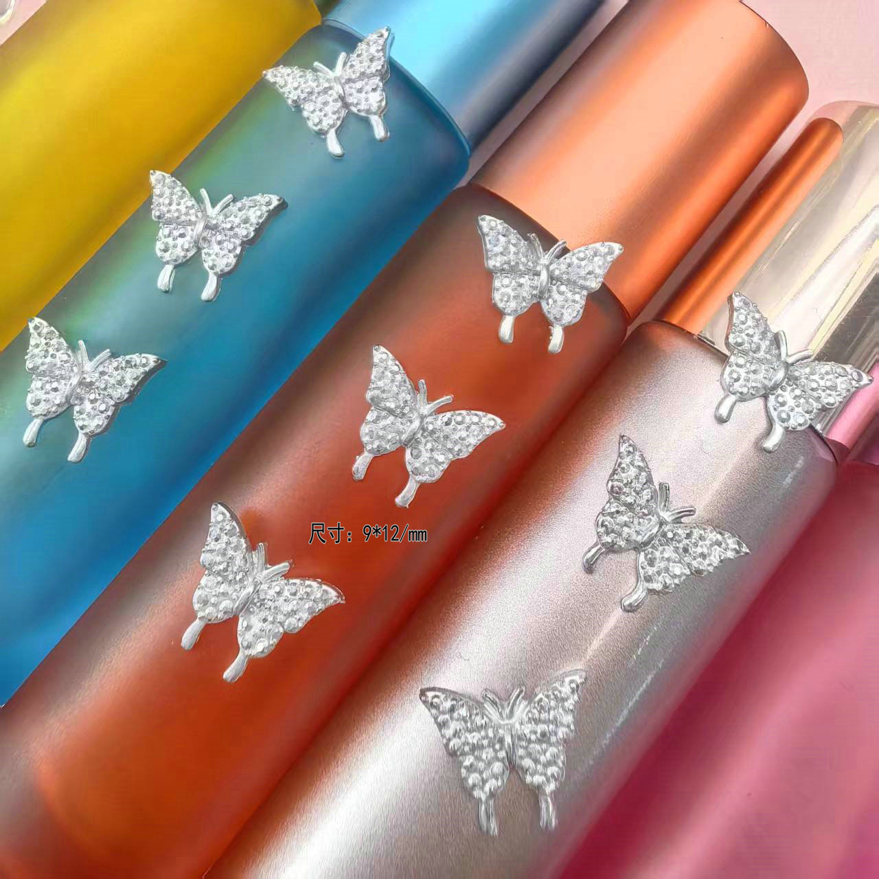 银色树脂蝴蝶美甲饰品批发.jpg