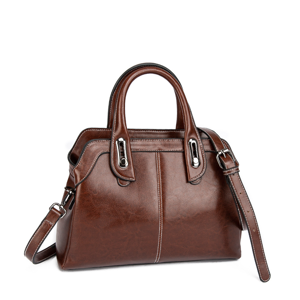Fashionable handbag made of genuine leather with large capacity in 2024. It is a trendy stylish middle-aged mom and_voghion.com