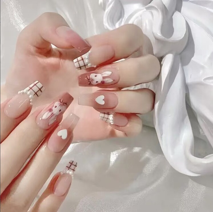Wear armour new love bunny nail art white cute girl light luxury nail patch removable finished wholesale Wear armour new love bunny nail art white cute girl light luxury nail patch removable finished wholesale