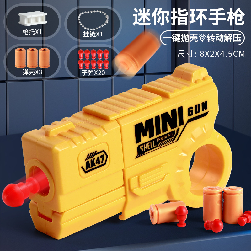 Mini dedo para niños, anillo de descompresión, pistola giratoria, puede lanzar proyectiles, juguetes geniales, juguetes novedosos para niños al por mayor