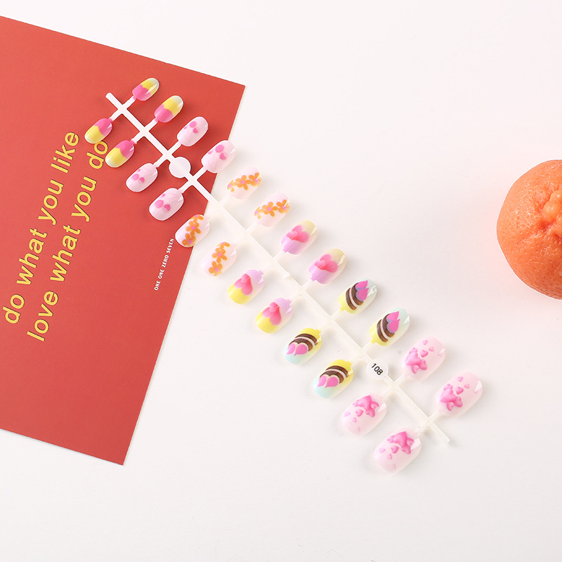 Nuevo desgaste de los niños uñas color amor niños uñas pegatinas patrón simple pintado de uñas en stock comercio exterior exclusivo