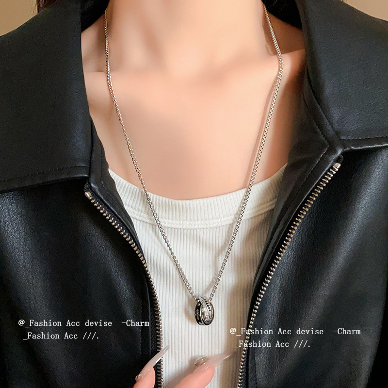 Geometric pendant with zircon