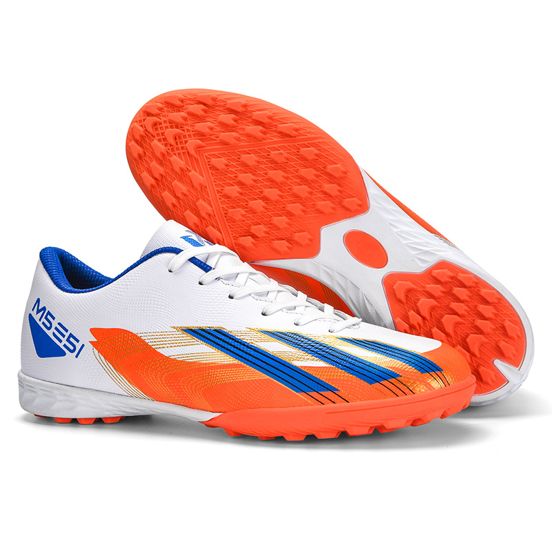 Zapatos de fútbol al por mayor transfronterizos masculinos Macy Falcon bajos clavos de clavos estudiantes juveniles zapatillas antideslizantes