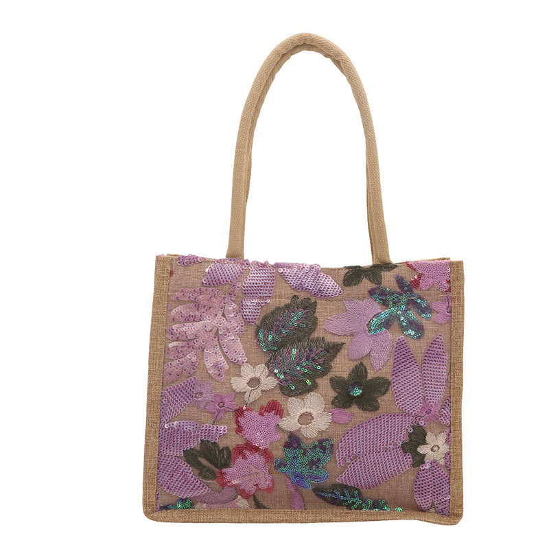 Explosiones transfronterizas 2026 textura de lino de alta calidad, flores bordadas, bolsas de tendencia horizontales, bolsas de compras de aire exterior