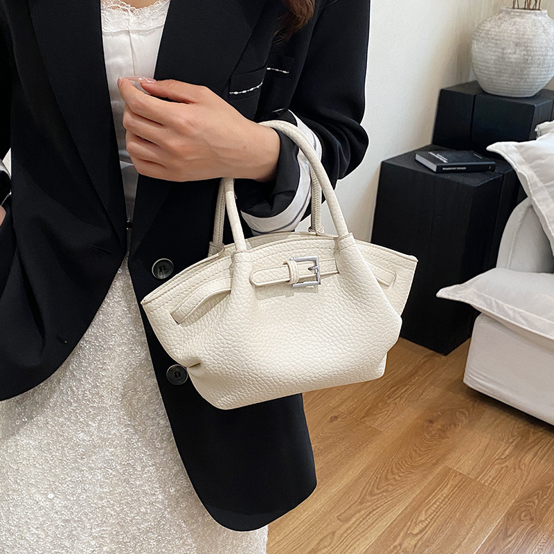 Bolso de textura transfronteriza 2025 verano nuevo estilo bolso de hombro con patrón de lichi bolso de mensajero casual de todo fósforo mujer