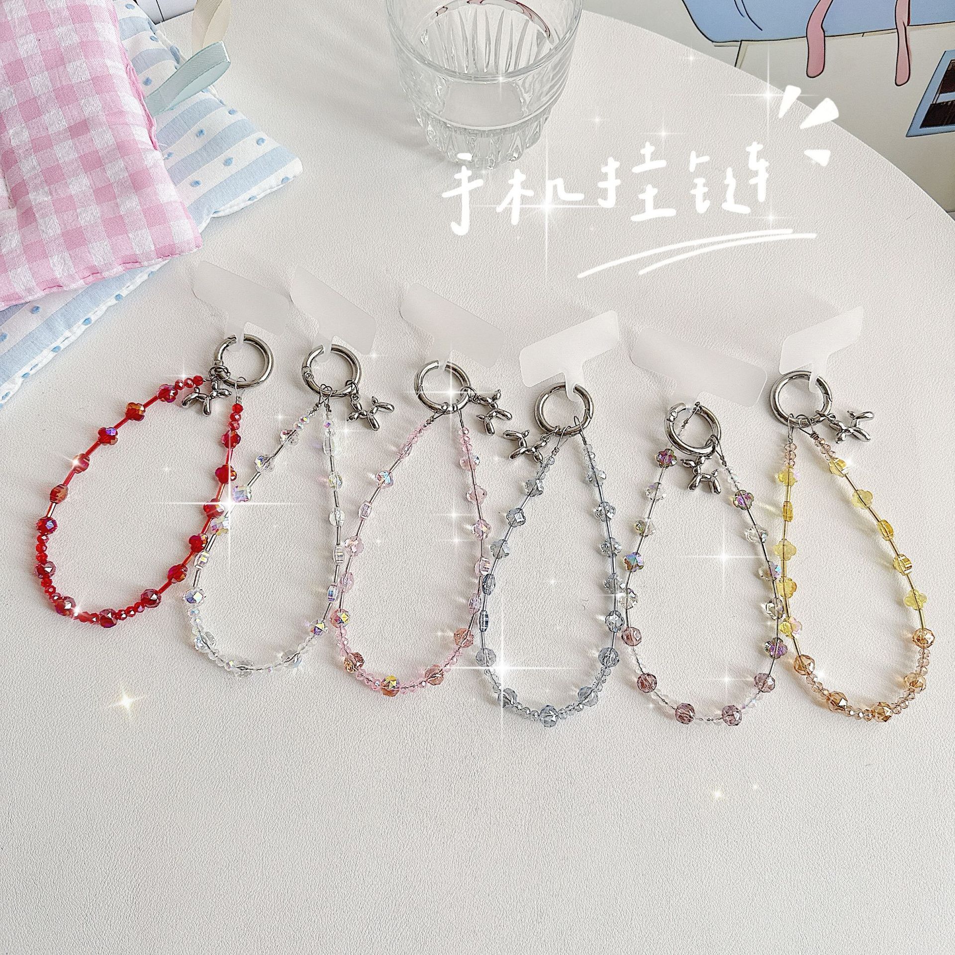 Boutique hecho a mano de alta gama para teléfono móvil cadena de muñeca de trébol de cuatro hojas de cristal original cadena de teléfono móvil de moda cuerda corta