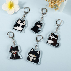 漫画版の子猫周辺アクリルキーホルダーかわいい猫座りシリーズキーホルダーカップルペンダント装飾