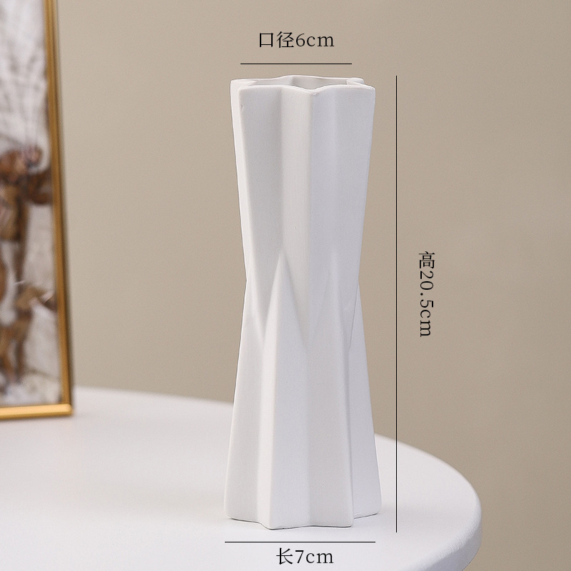 シンプルな現代の満天星陶磁器の花瓶の置物の客間の白い磁器の小さい清新な乾いた花の生け花の創意の陶磁器の花器|undefined