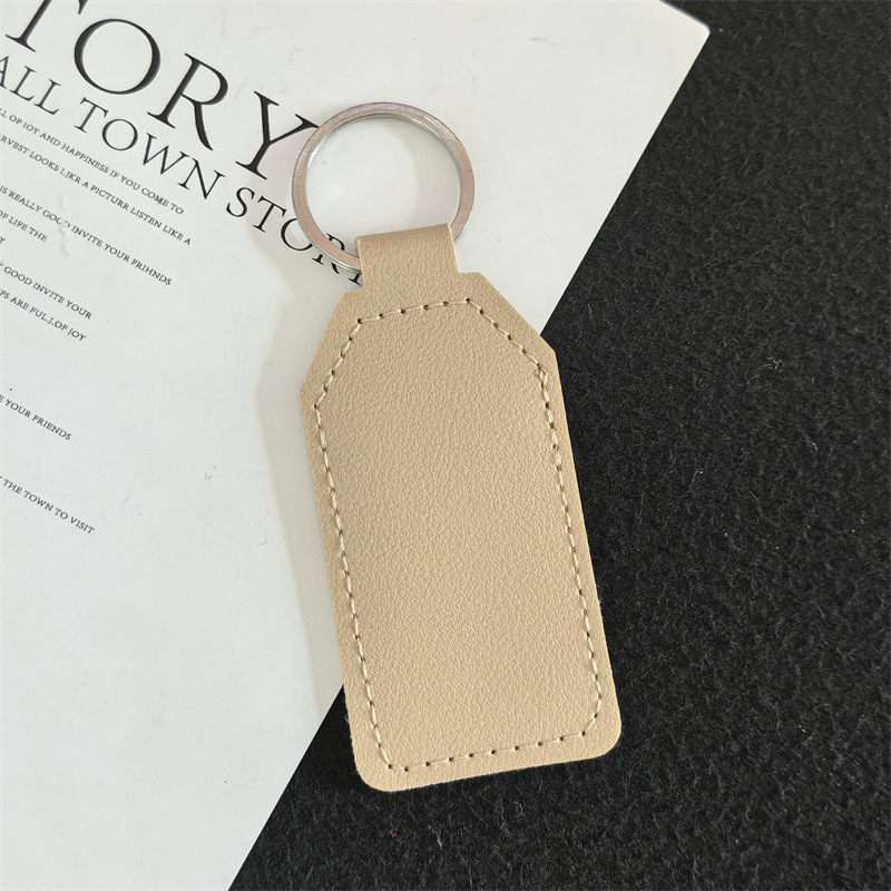 Spot bolso de cuero, bolso escolar, llavero, colgante, llavero de cuero para hombres y mujeres, regalo de negocios