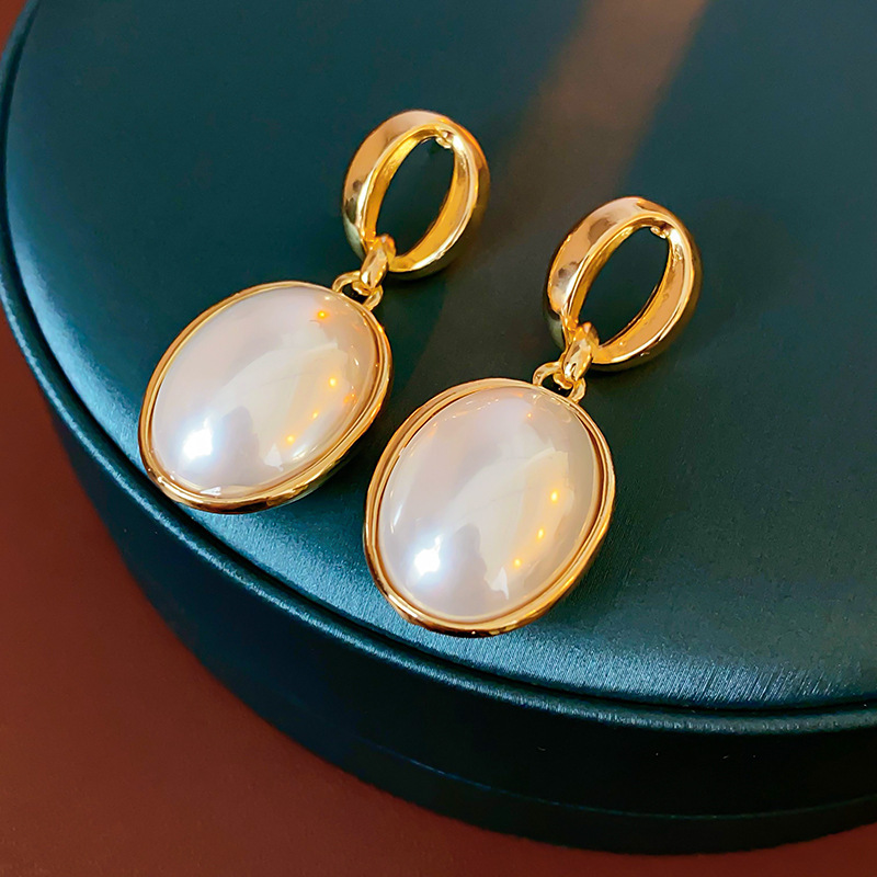 Pendientes de camelia de simulación de aguja de plata Pendientes elegantes retro francés Pendientes de todo fósforo de moda personalizada