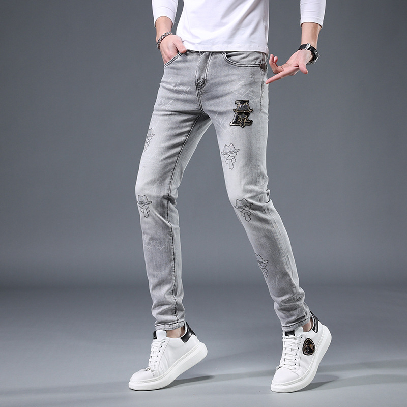 Jeans para hombre nueva tendencia en el verano de 2022 slim y casual marca Joker pantalones de pies grises de perforación caliente marea._voghion.com