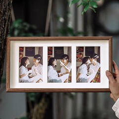 壁をかける4中空二三影楼は絵の枠をつないで卸売りします。