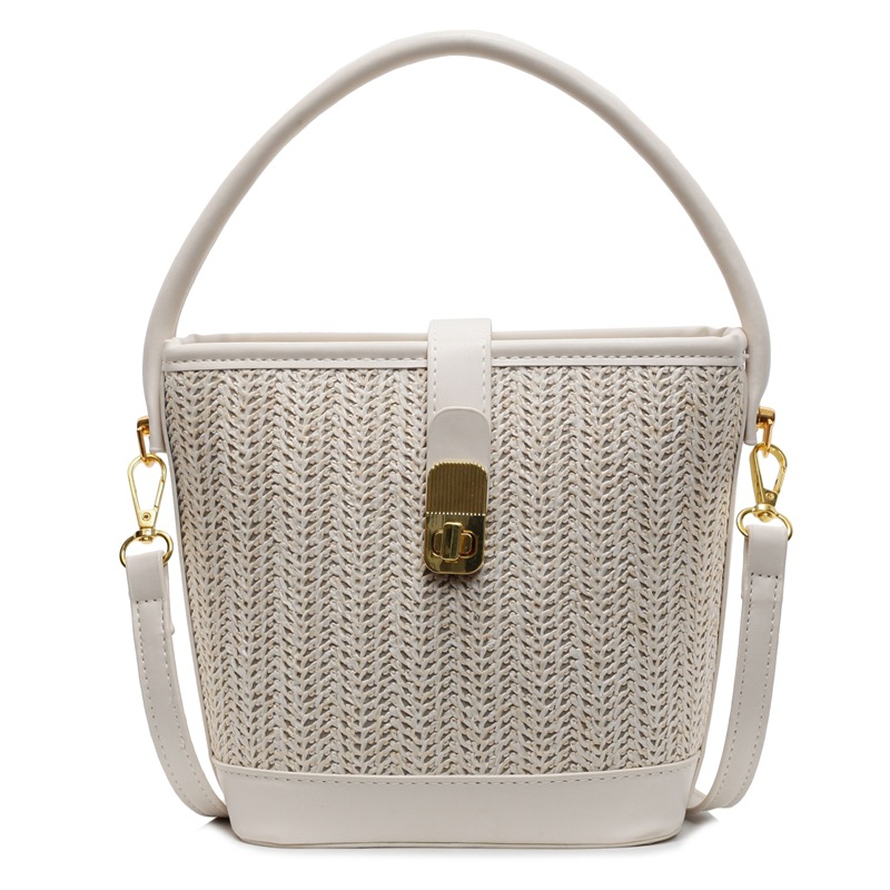 Bolsa de mano de tejido de verano super caliente para mujeres 2025 nuevo bolso de playa de vacaciones de alta calidad bolso de cubo de ocio