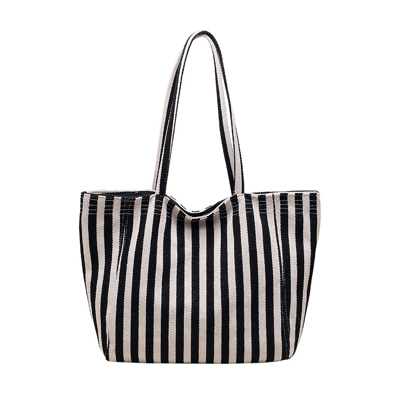 Pequeña bolsa de lona a rayas frescas de hombro para mujeres, bolsas escolares de clase de gran capacidad, bolsas de compras japonesas y coreanas, bolsas especiales.