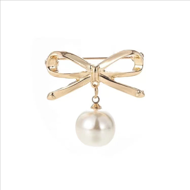 Broche de perlas anti-exposición transfronteriza brillante perla pin bufanda de seda hebilla pin broche fijo cintura adelgazante artefacto