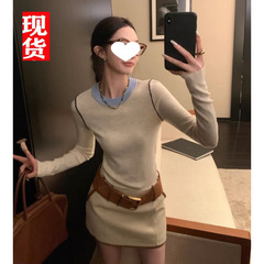 欧陽は色のニットの女性の冬の新型の丸首の中で底のシャツを掛けて身を修めるのがやせている長袖の上着を現します。
