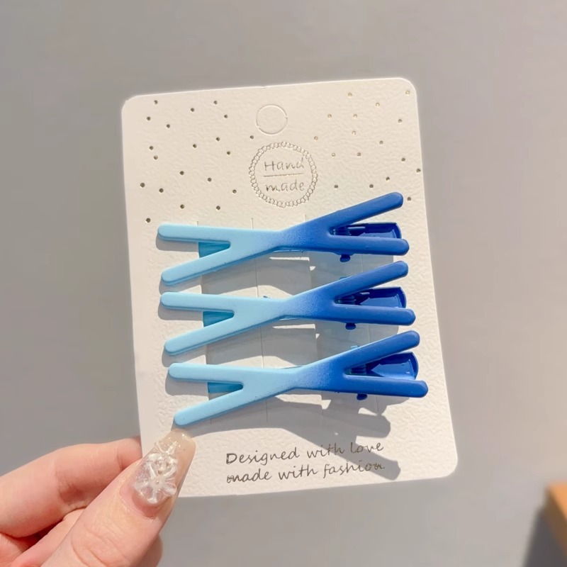 Klein azul clip para el cabello de la mujer alta sensación de cejas cortadas clip lateral sin marcas de maquillaje clip para el cabello de cabeza clip para el cabello