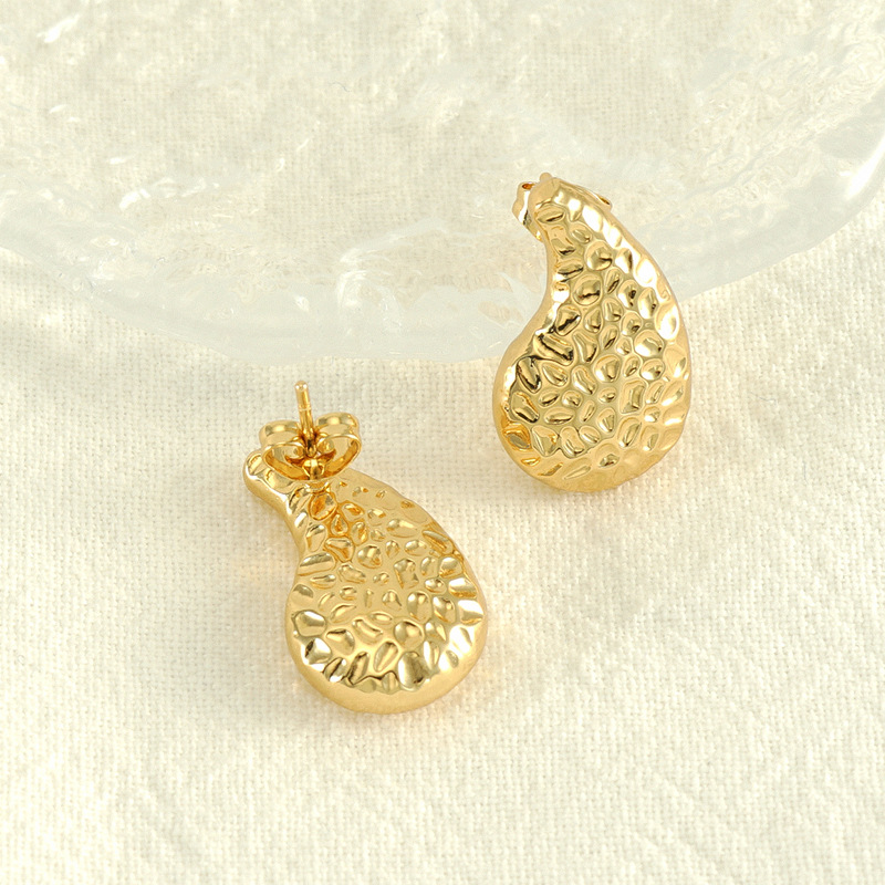 Cruz-frontera europea y americana desigual textura gota-en forma de pendientes de moda todo fósforo de acero inoxidable pendientes de la joyería al por mayor para las mujeres