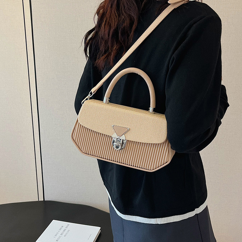 Bolso de moda transfronterizo 2025 verano nuevo bolso femenino de alta calidad textura bolso de hombro bolso de mensajero a rayas de moda marea