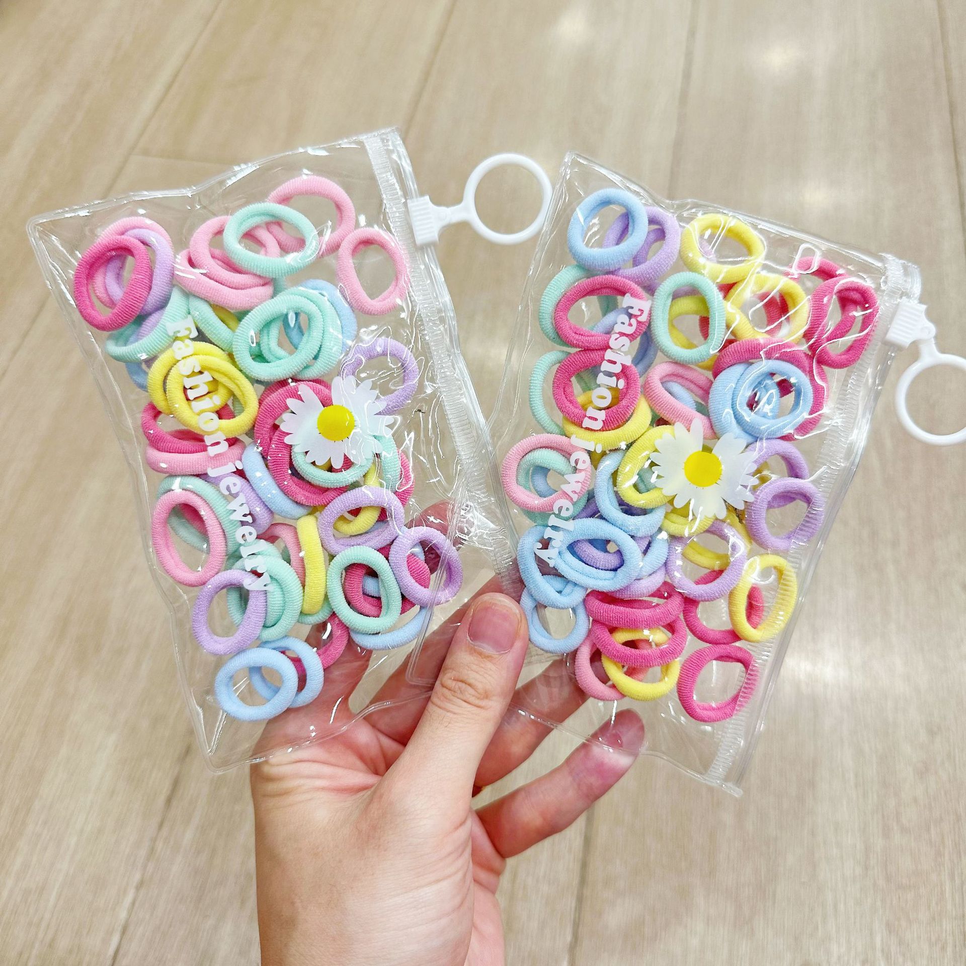 Mini cabeza de princesa en caja, clip de agarre pequeño, clip de flequillo, horquilla rota en la frente, banda elástica para niños, no daña el cabello, anillo del pulgar al por mayor image 97