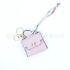 Pendant, purple small bag