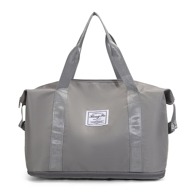 Nueva bolsa de almacenamiento impermeable transfronteriza mayorista Oxford expansión de gran capacidad portátil simple bolso de hombro deportivo