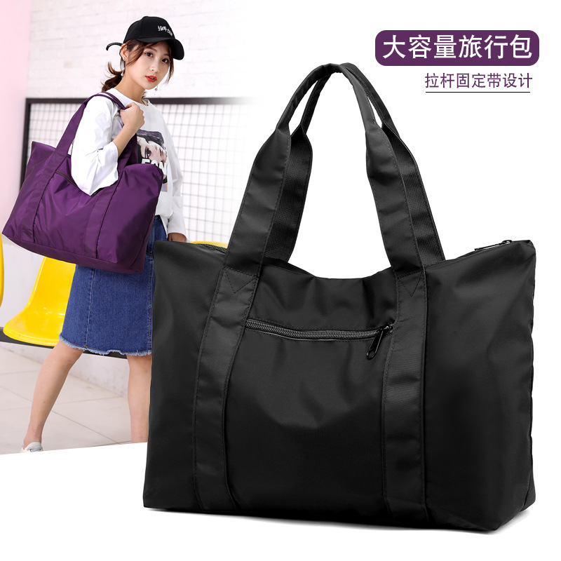 Moda nuevo japonés y coreano simple color sólido bolso de hombro portátil nylon impermeable bolsa de viaje bolsa de fitness bolsa de almacenamiento de la momia