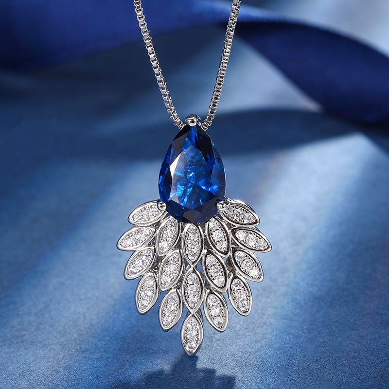 2024 nuevo estilo Zhuang Sheng joyería cobre inferior chapado en oro moda simulación color tesoro corindón temperamento colgante traje femenino 8*12