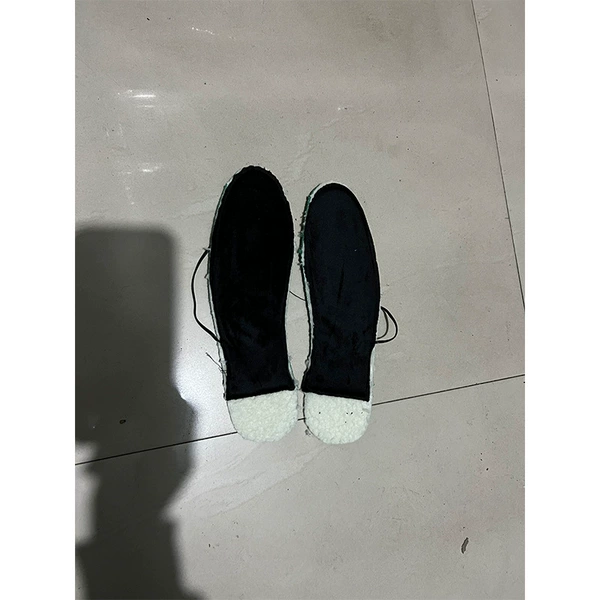 A pair of heated insoles