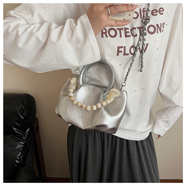 A stylish and trendy beaded bag for women, a new summer chain crossbody cloud bag for women in 2025 undefined