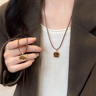 Autumn and Winter Tiger Eye Leather Rope Pull Necklace Women's Maillard Yadan Style Long Sweater Simple Fashion Collarbone