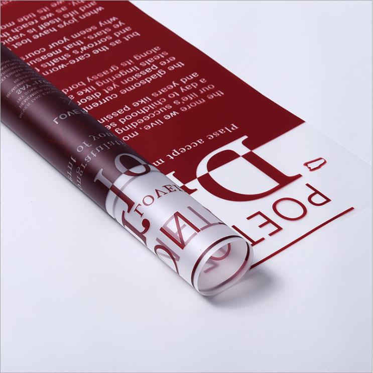 Fabricante de fiestas de flores al por mayor nuevo patrón de amor de San Valentín papel de embalaje de flores floristería translúcida ramo de flores