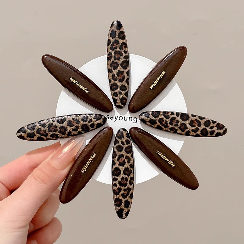 Temperamento acético cabello estriado lateral clip de cabello 2025 nuevo estilo retro puerto clip de boca de pato simple clip de cabello tocado