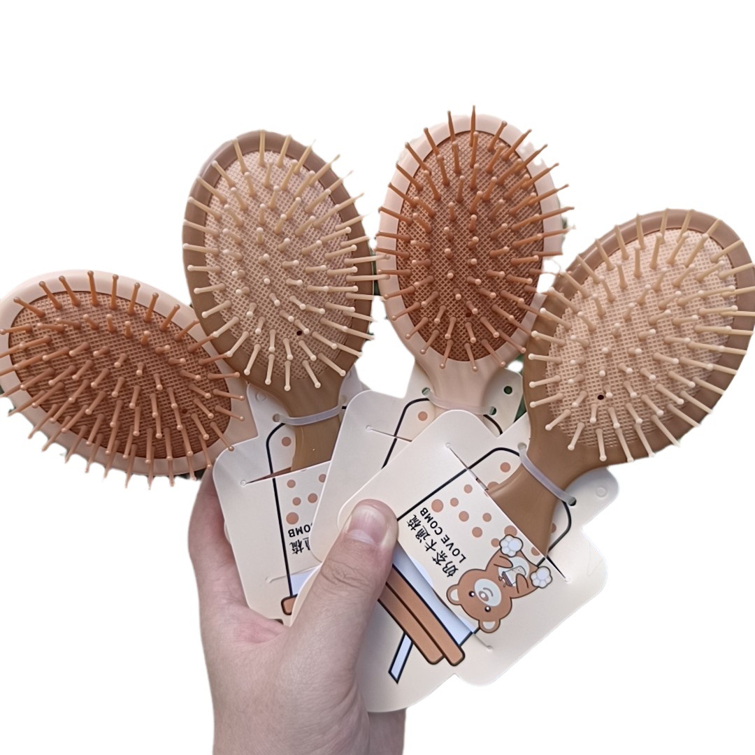 Bonito peine de peinado color macarrón con cojín de aire para masaje, adecuado para uso doméstico y dormitorios estudiantiles, cepillo de pelo de plástico suave con cojín de aire.