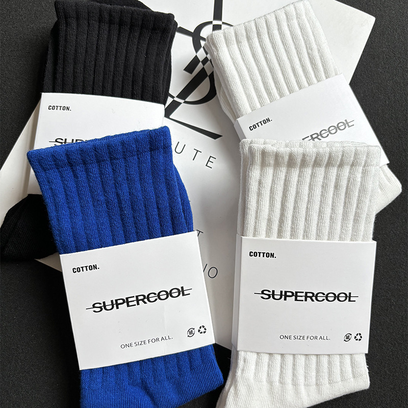 Men's socks socks black and white blue solid color cotton deodorant stockings autumn and winter men's and women's sports socks boys stockings tide