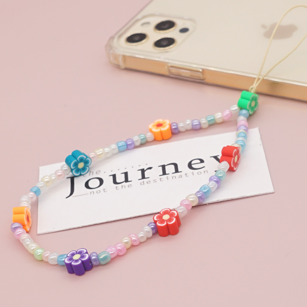 Simple Mobile Phone Rope Soft Ceramic Mixed Color Flower Glass Rice Beads Mobile Phone Chain display picture 2