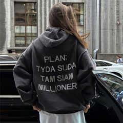 ヨーロッパのコードの肩の袖のXS-5XLの秋の婦人服の新型のファッションの帽子のアルファベットの人気の街頭のファッションのゆったりしているコート