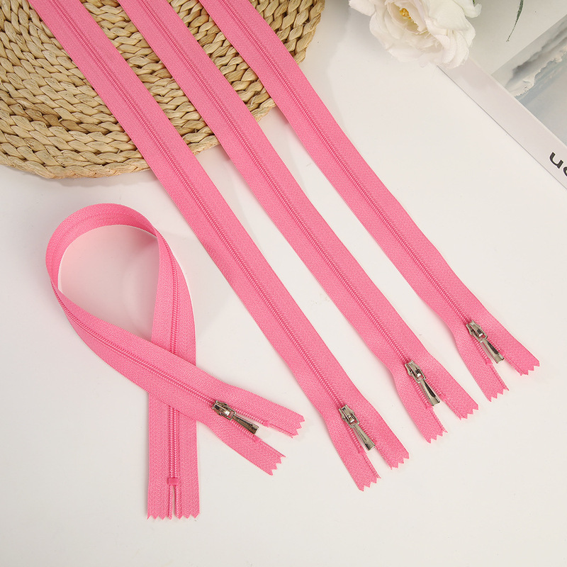 Pure Pink Metal Zipper with Self-Locking Slider for Jackets, Clothing, Backpacks, Bags, Home Textiles, and Textile Accessories Wholesale Pure Pink Metal Zipper with Self-Locking Slider for Jackets, Clothing, Backpacks, Bags, Home Textiles, and Textile Accessories Wholesale