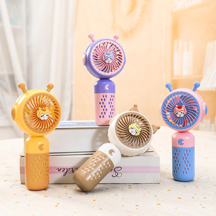 Mini handheld cartoon dragon year doll USB charging small fan company annual meeting gift small electric fan wholesale