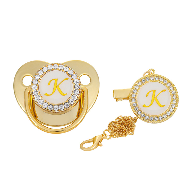 Venta directa de fábrica para niños chupete dorado destete artefacto bebé chupete boca letras A- Z