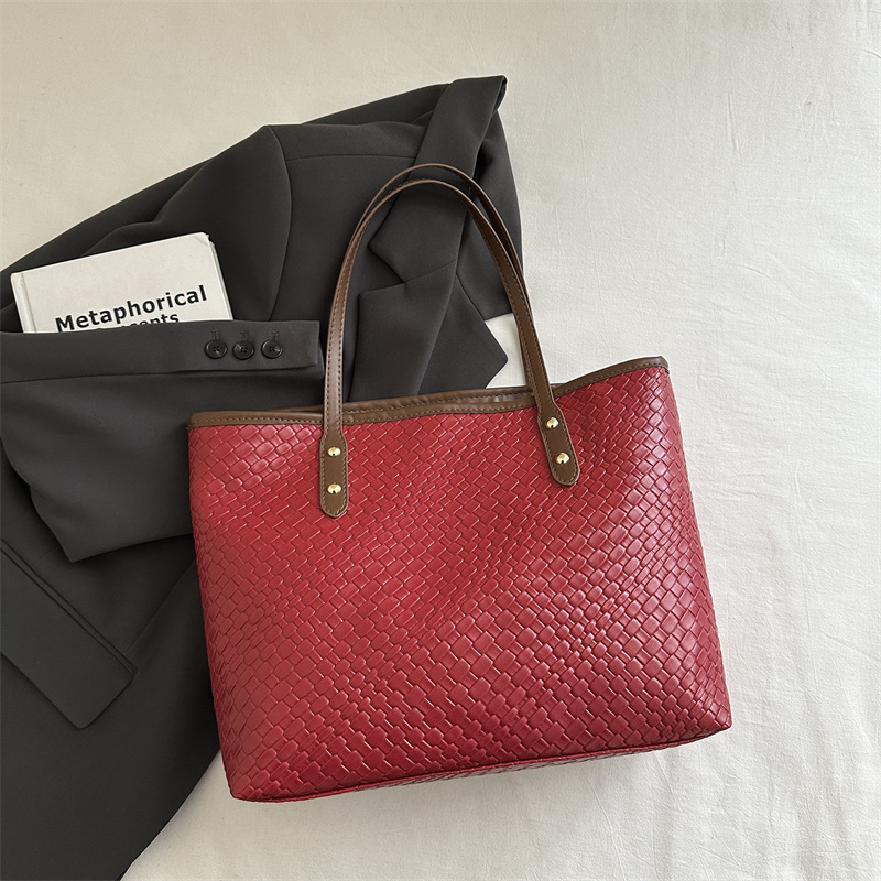 2025 nuevo estilo hermoso y simple bolso portátil portátil moda retro bolso de gran capacidad personalidad femenina bolso de axila de un solo hombro