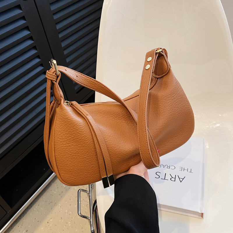 Bolso de hombro cruzado de alta calidad para mujer, nuevo estilo, con patrón de lichi, bolso de moda de nicho, tipo dumpling.