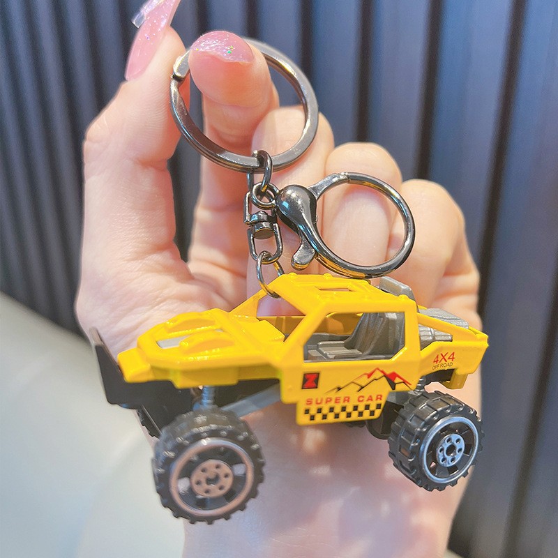 Aleación combinación Jeep Tire hacia atrás modelo de coche llavero bicicleta colgante creativo motocicleta bolsa llavero