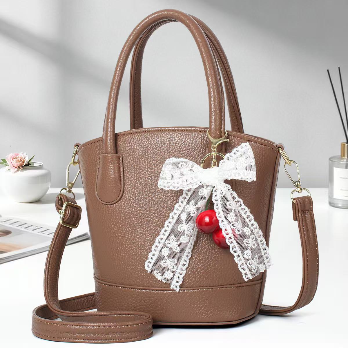 Cestas de verduras casuales simples bolsos de mano bolsas de cubo de viaje de moda colgante universal bolsas de hombro transfronterizas