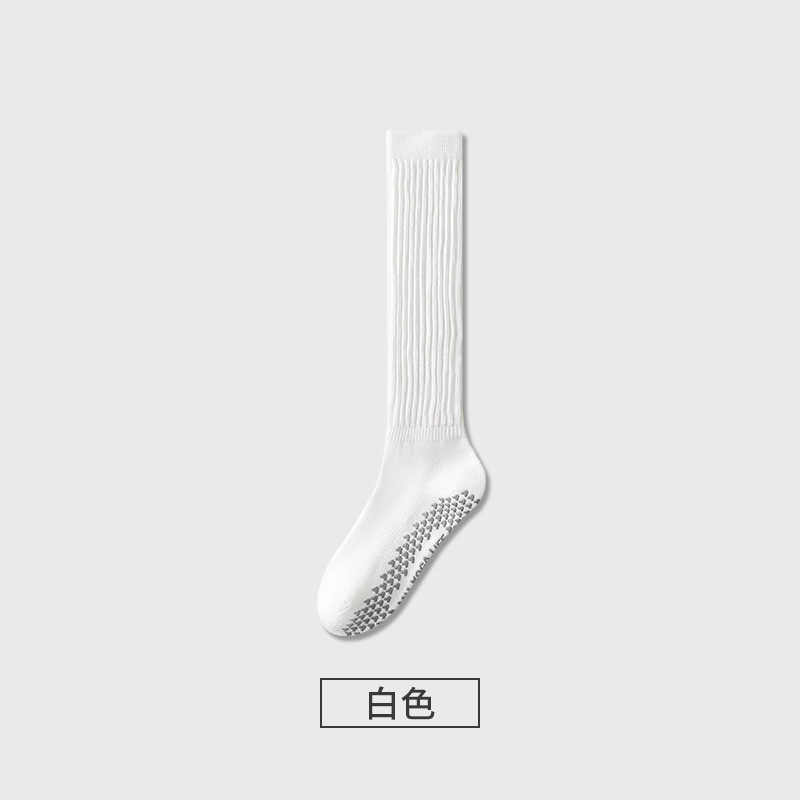 長筒ヨガ靴下の子供は秋冬に滑り止めを厚くして走る縄跳びバドミントン運動のフィットネスのすねの靴下を積みます。